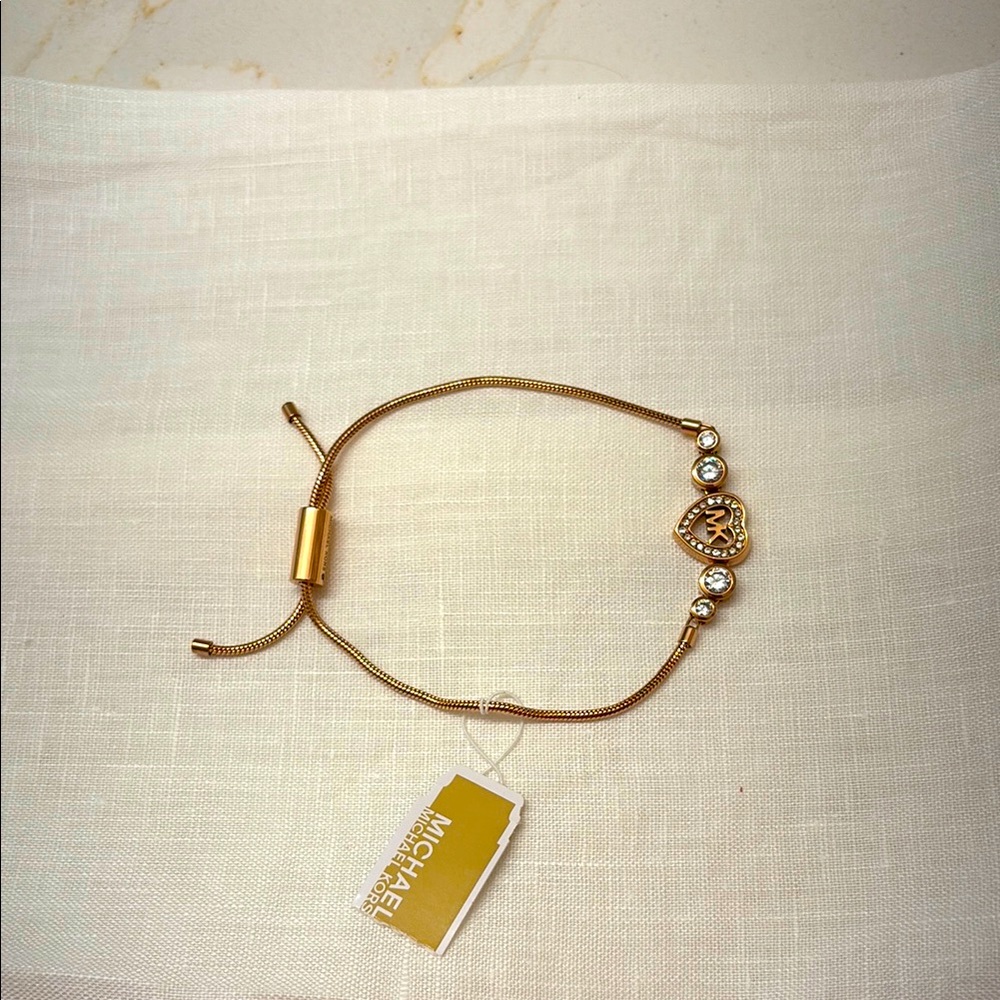 NWT Michael Kors Love is in the air adjustable bracelet.